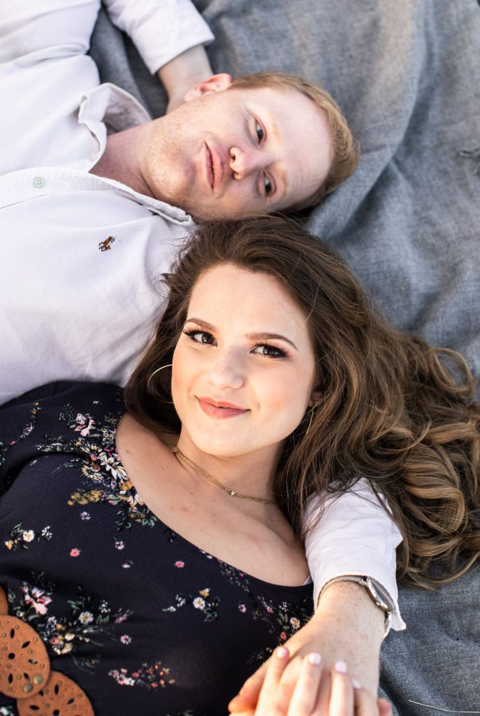 Max Patch Engagement session, couple laying on picnic blanket