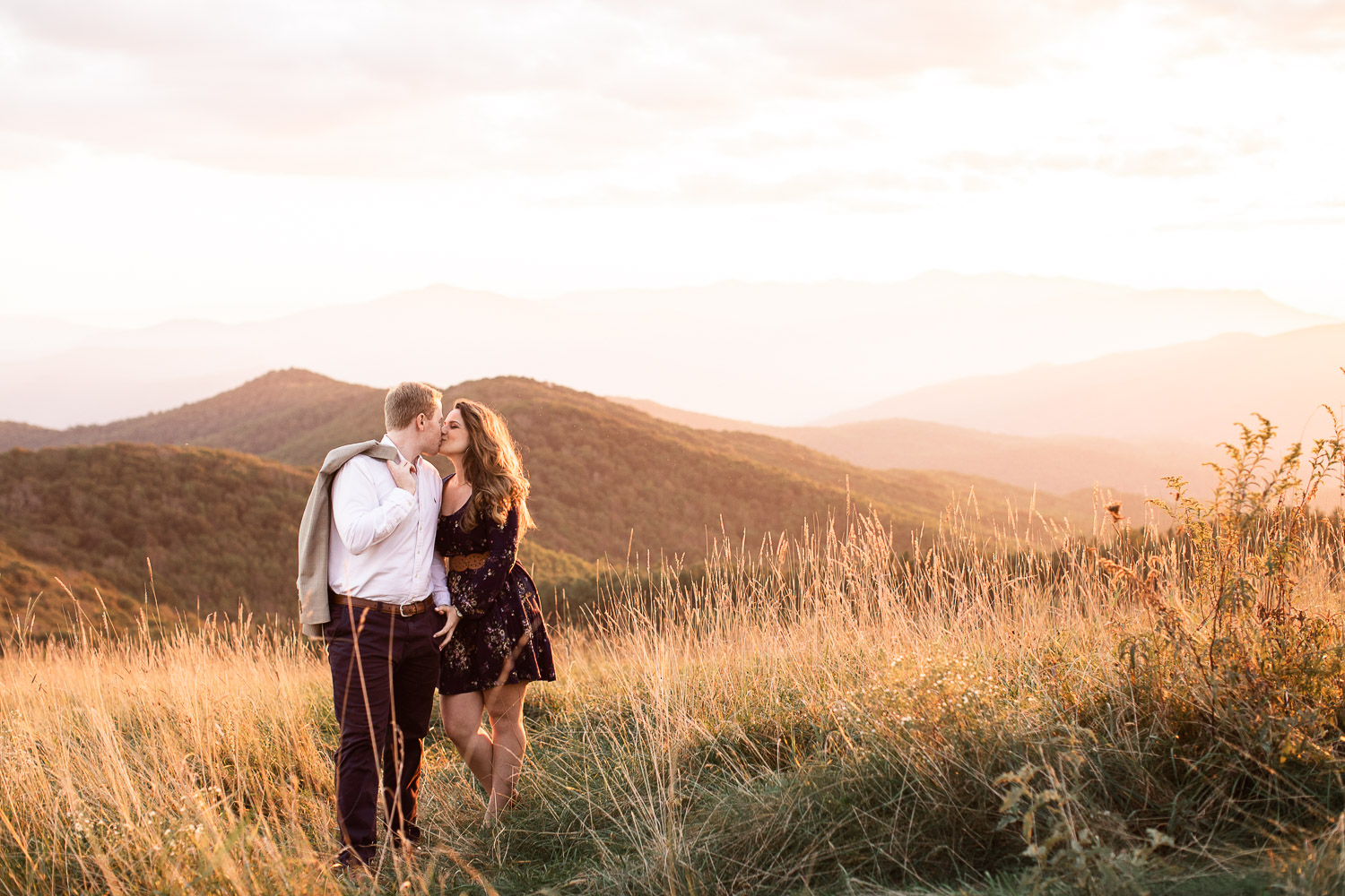 Max Patch, couple kissing at sunset