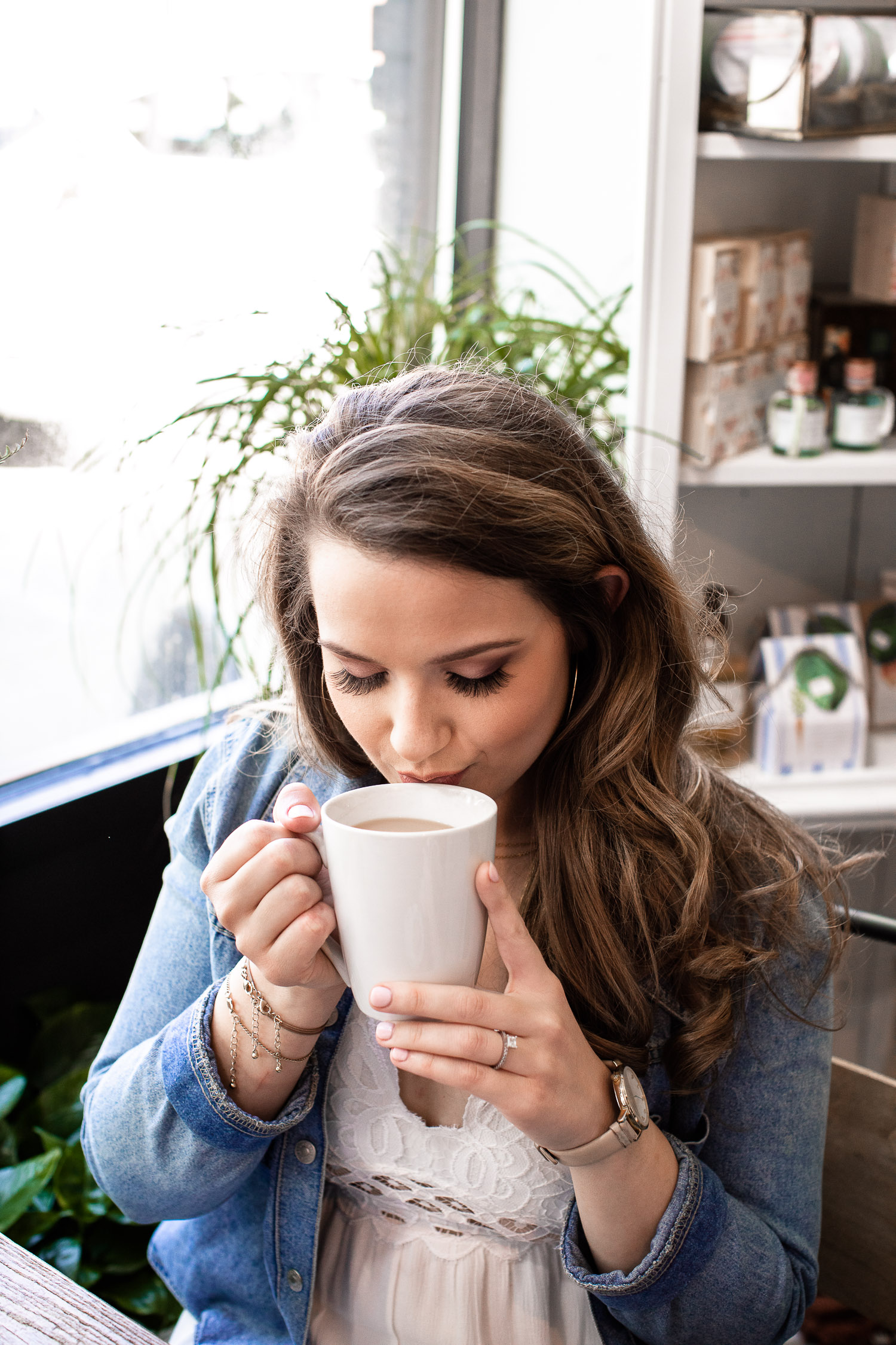 Flora, Asheville - woman drinking coffee