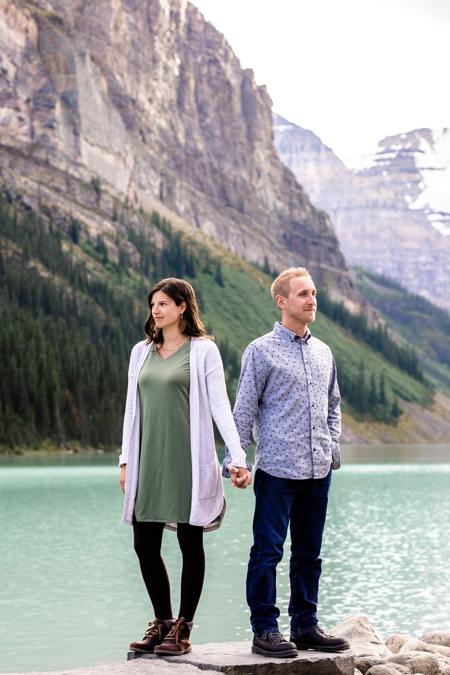 couple photo session at Lake Louise, mountains in background