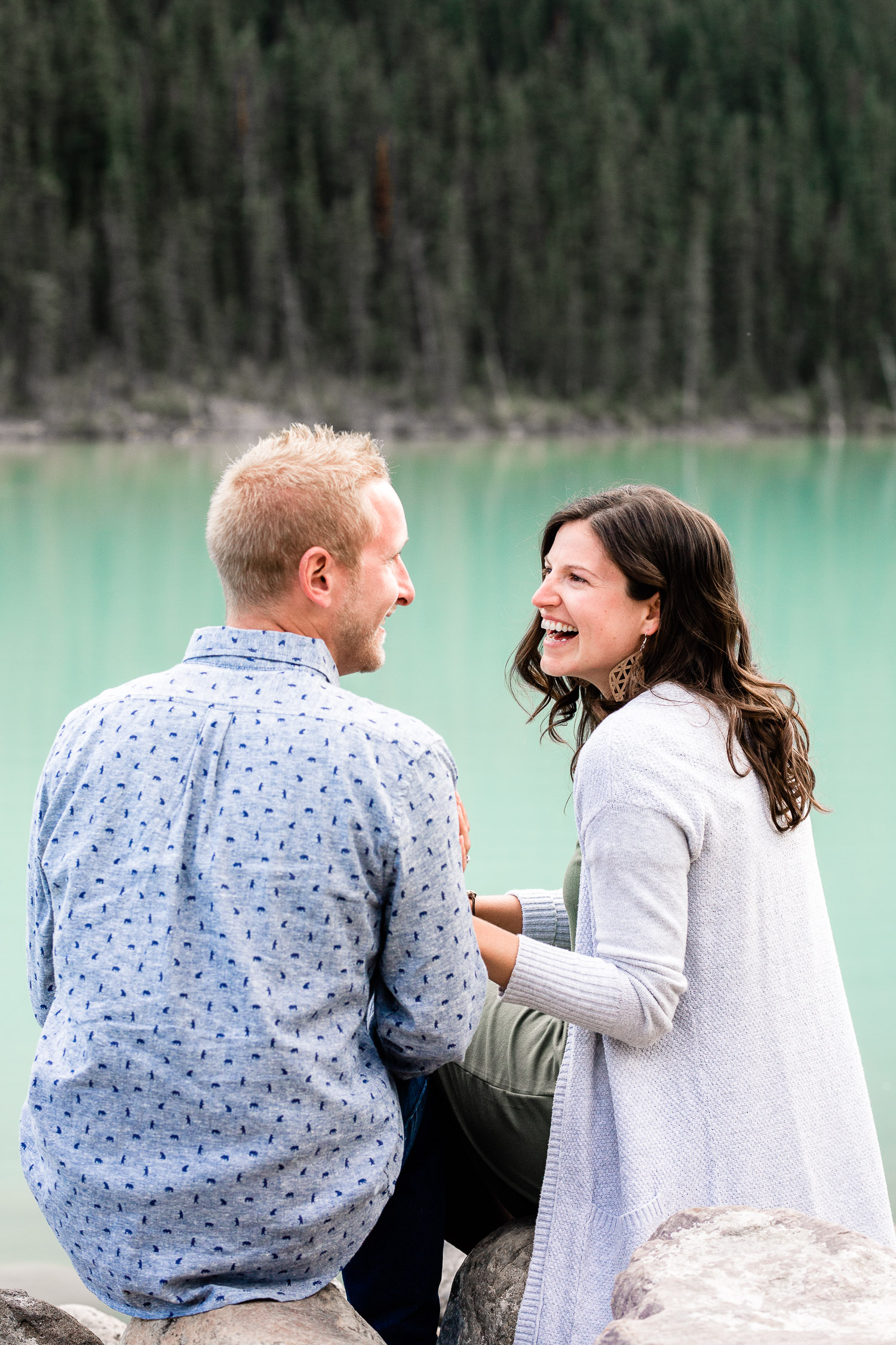 couple enjoying photo session at lake louise