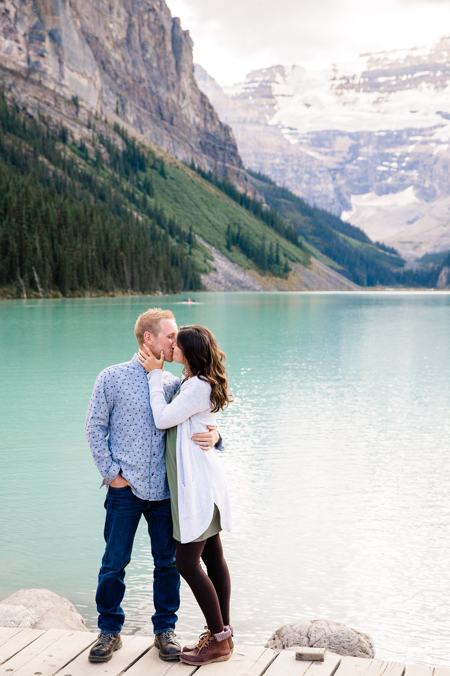 Couple kissing at photo session at Lake Louise, Canada
