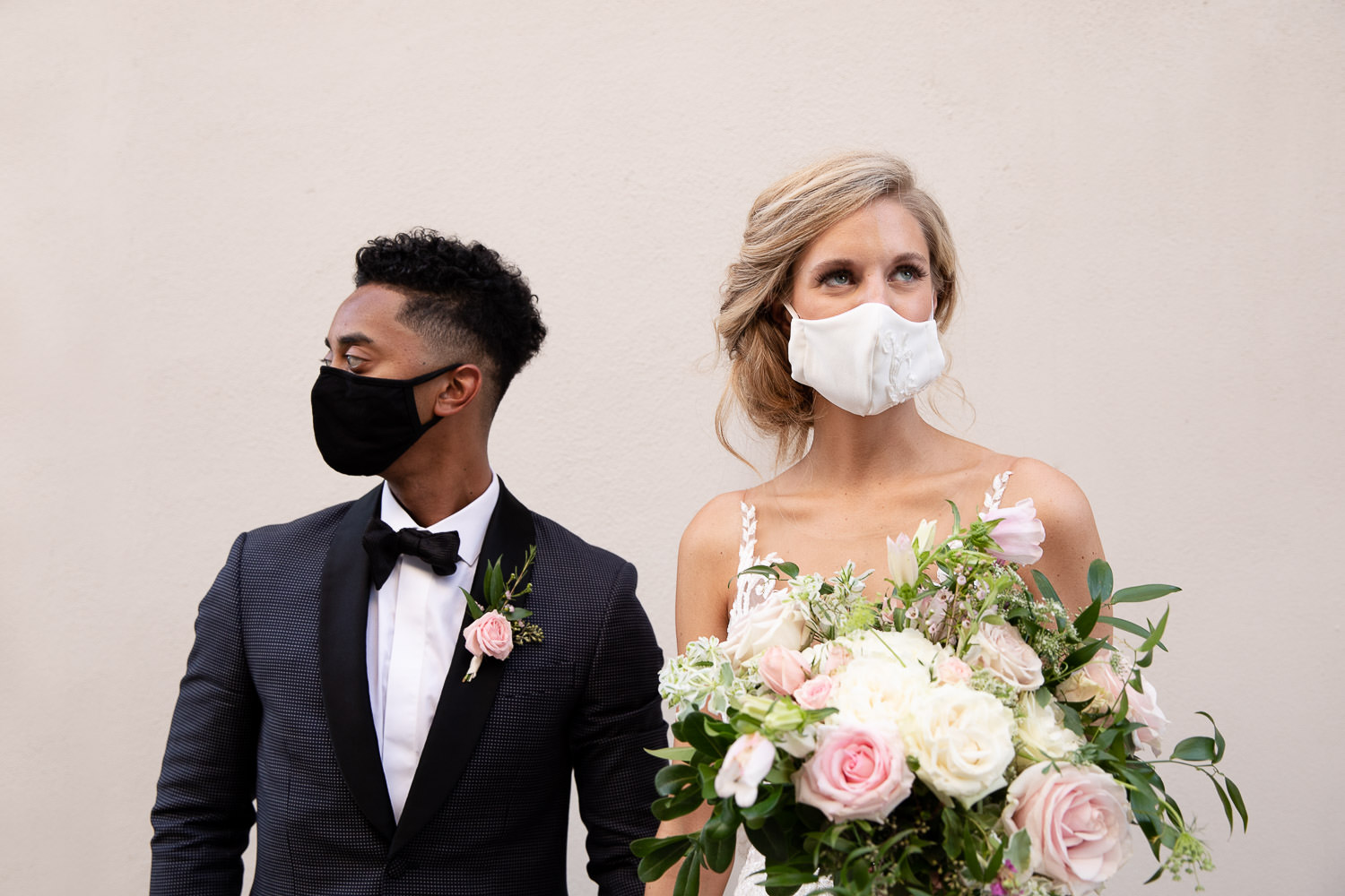 Merchant Hall wedding | Bride and groom with masks