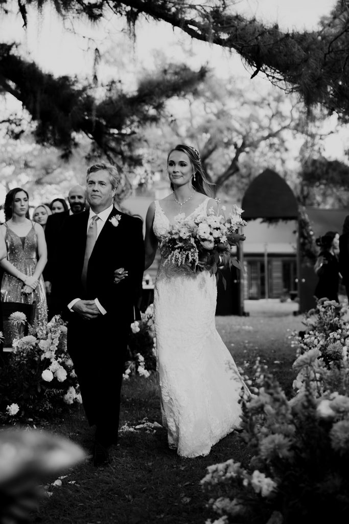 Father and bride walking down the aisle at Magnolia Plantation wedding