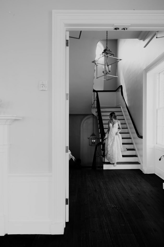 Bride walking downstairs in the Gadsden House