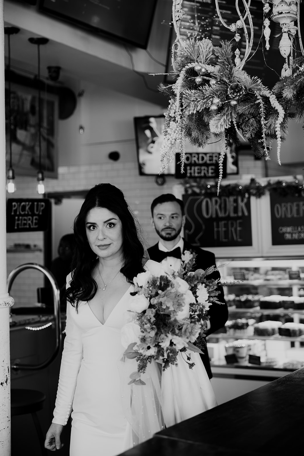 Bride and groom picking their wedding cake after their Charleston elopement