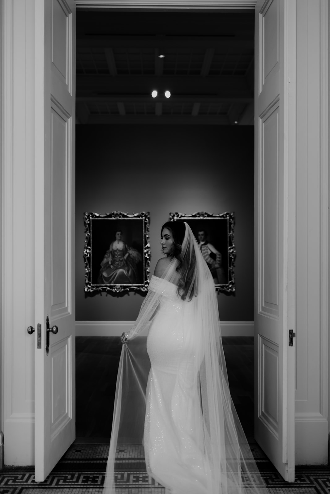 Bridal photo session by Franzi Annika Photography in Gibbes Museum. Bride standing in door looking over her shoulder.