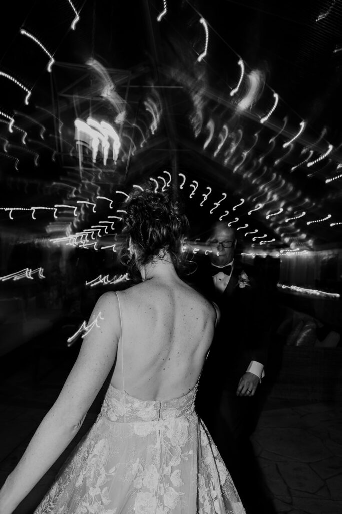 Artsy photo of bride and groom during first dance