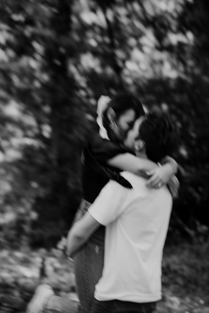 Couple kissing at Cypress gardens photo session