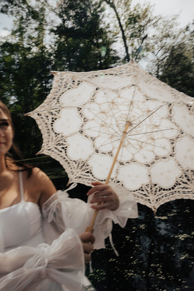 Parasol as perfect prop for Cypress garden engagement photos 