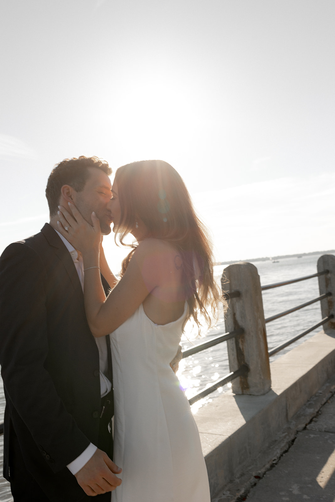 Couple kissing at Charleston Battery during Charleston Engagement photo Session