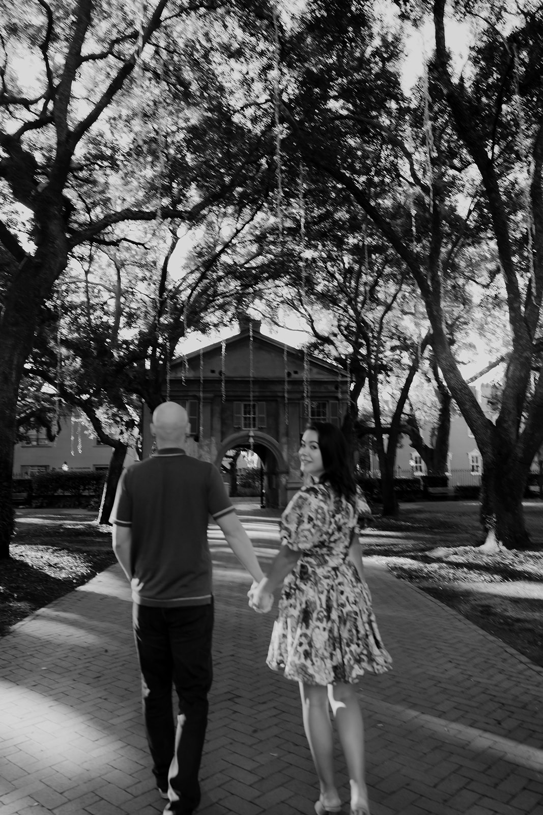 Walking the campus for Engagement Session at the College of Charleston