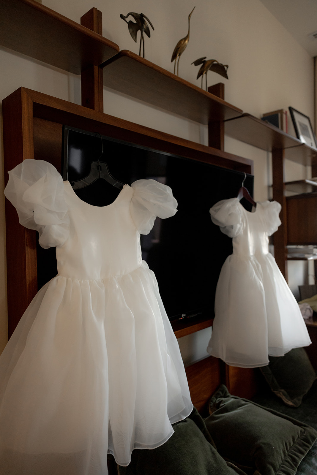 Flower girl dresses hung before wedding