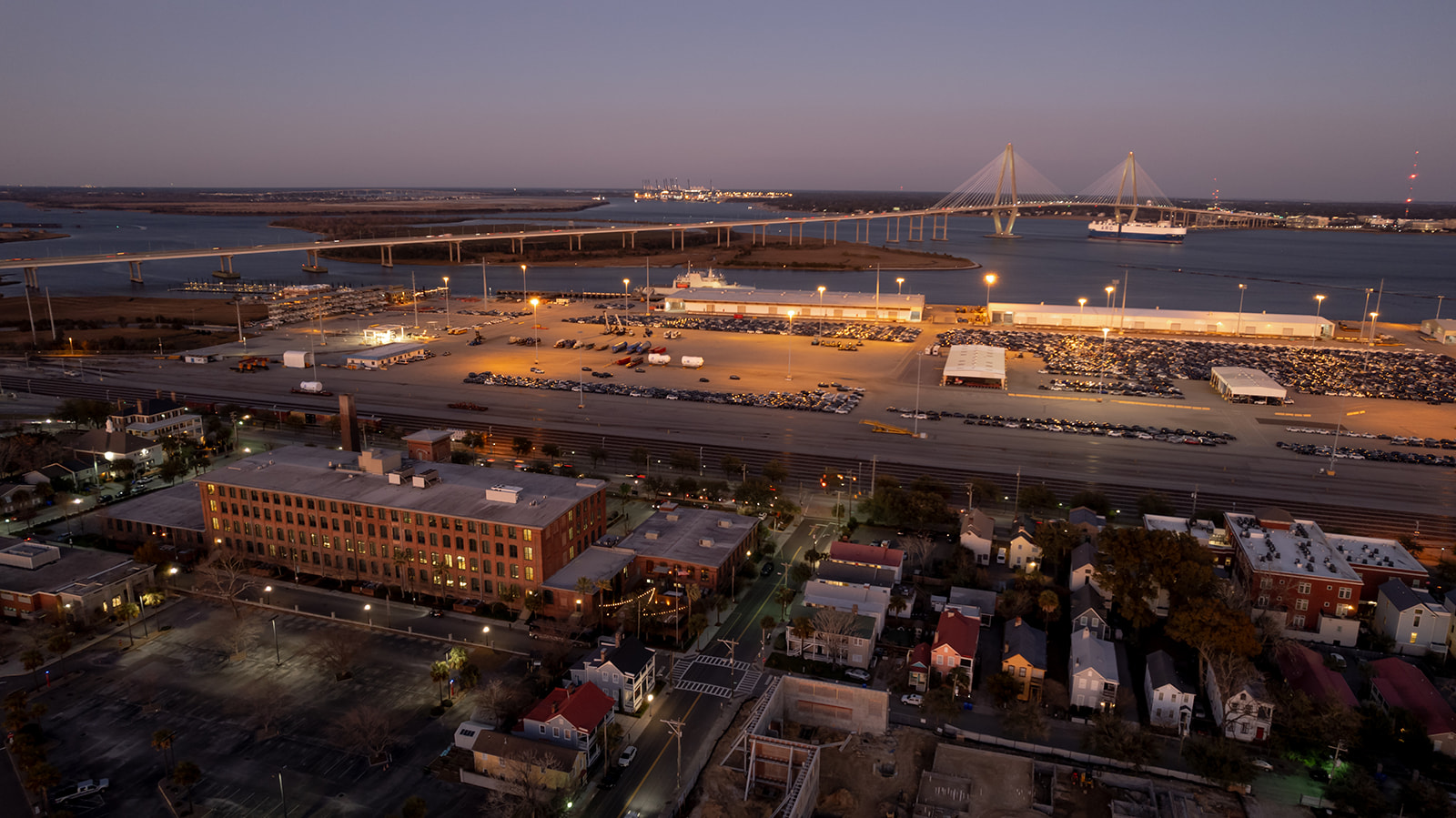 Aerial photo of the cedar room with the charleston harbor in the background. Photographed during sunset