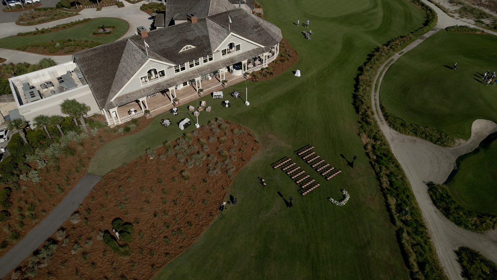 Kiawah Ocean Course wedding photographed with drone showing ceremony space and kiawah club house