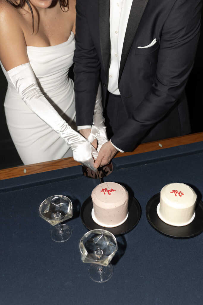 Cake cutting at Charleston Elopement with his and her cake