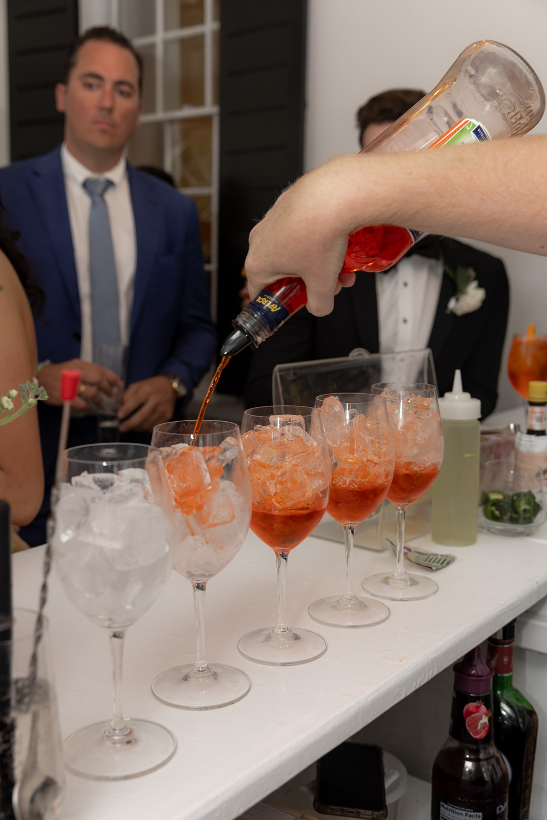 Aperol Spritz are being prepared at Lowndes Grove wedding