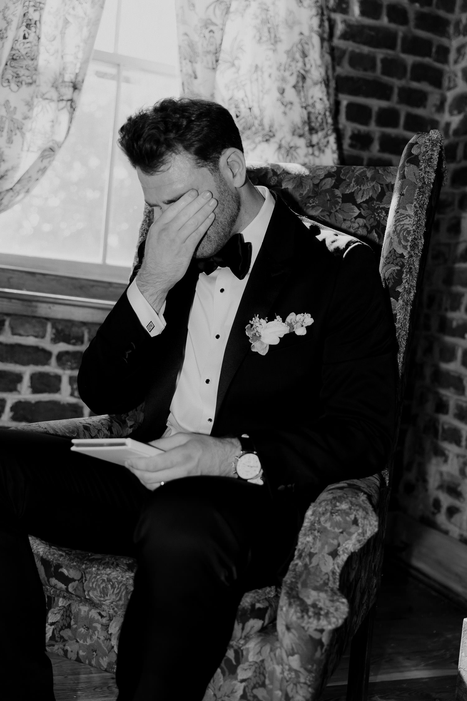 Emotional groom after reading private vows before CHarleston wedding ceremony