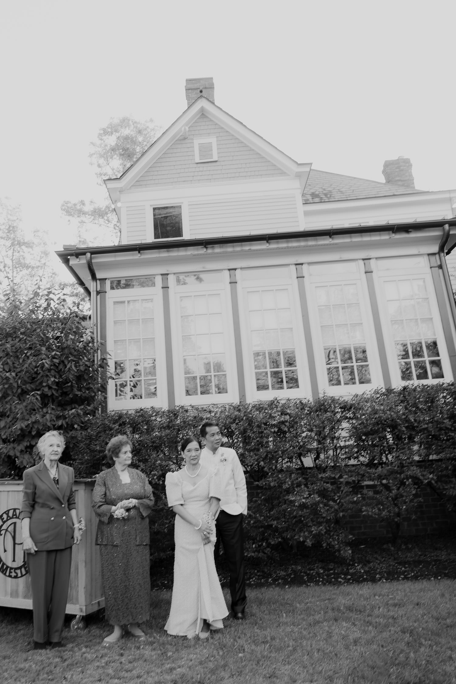 Family awaiting their turn for family portraits at wedding at Alexander Homestead