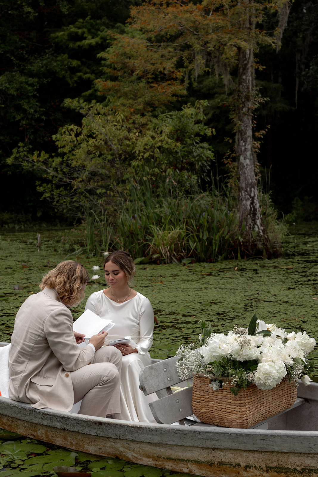 Couple exchanging private vows after Cypress Gardens Elopement. 