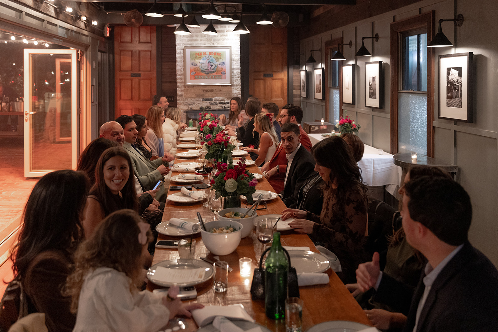 Long table for family style rehearsal dinner at Leon's Oyster Shed