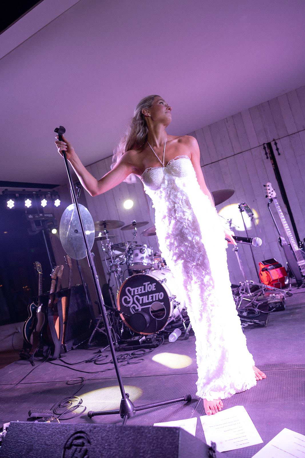 The bride performs on stage at Middleton Place Wedding.